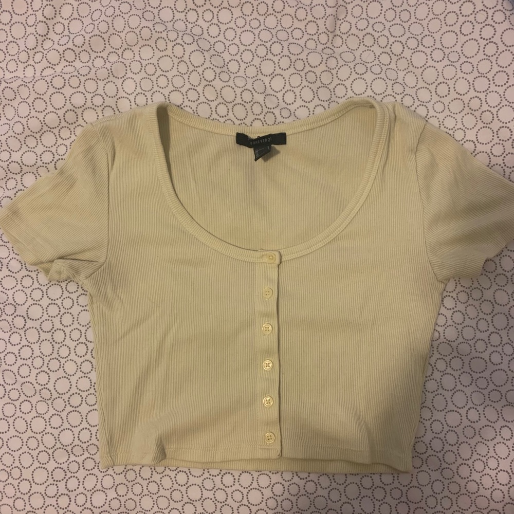 yellow cropped shirt